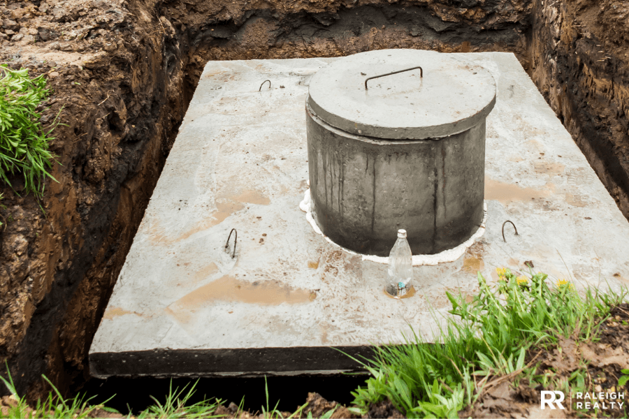 A picture of a septic tank that was installed after purchasing land and building a home
