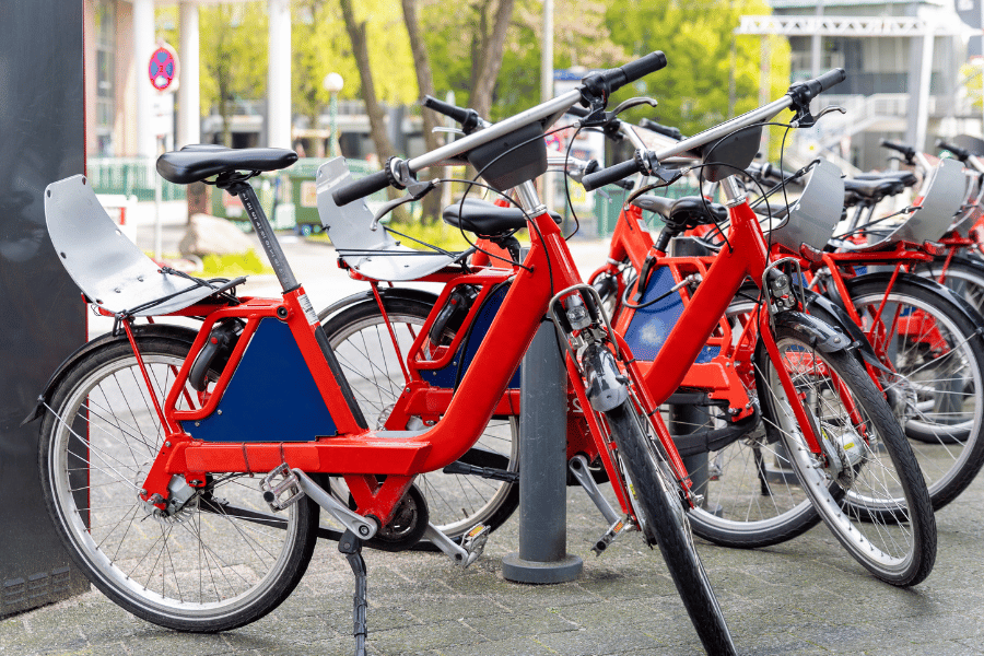 red bikeshares downtown in station