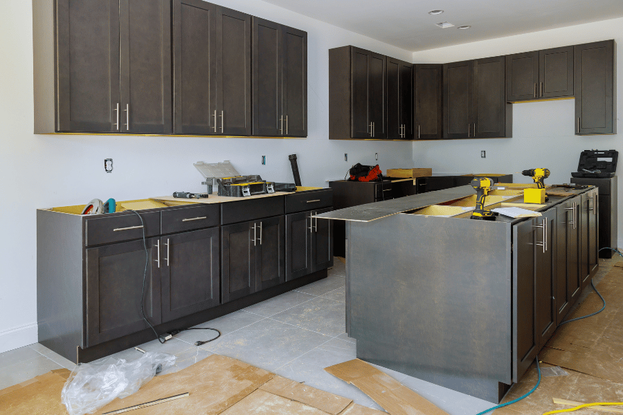 Adding new countertops to the kitchen cabinets